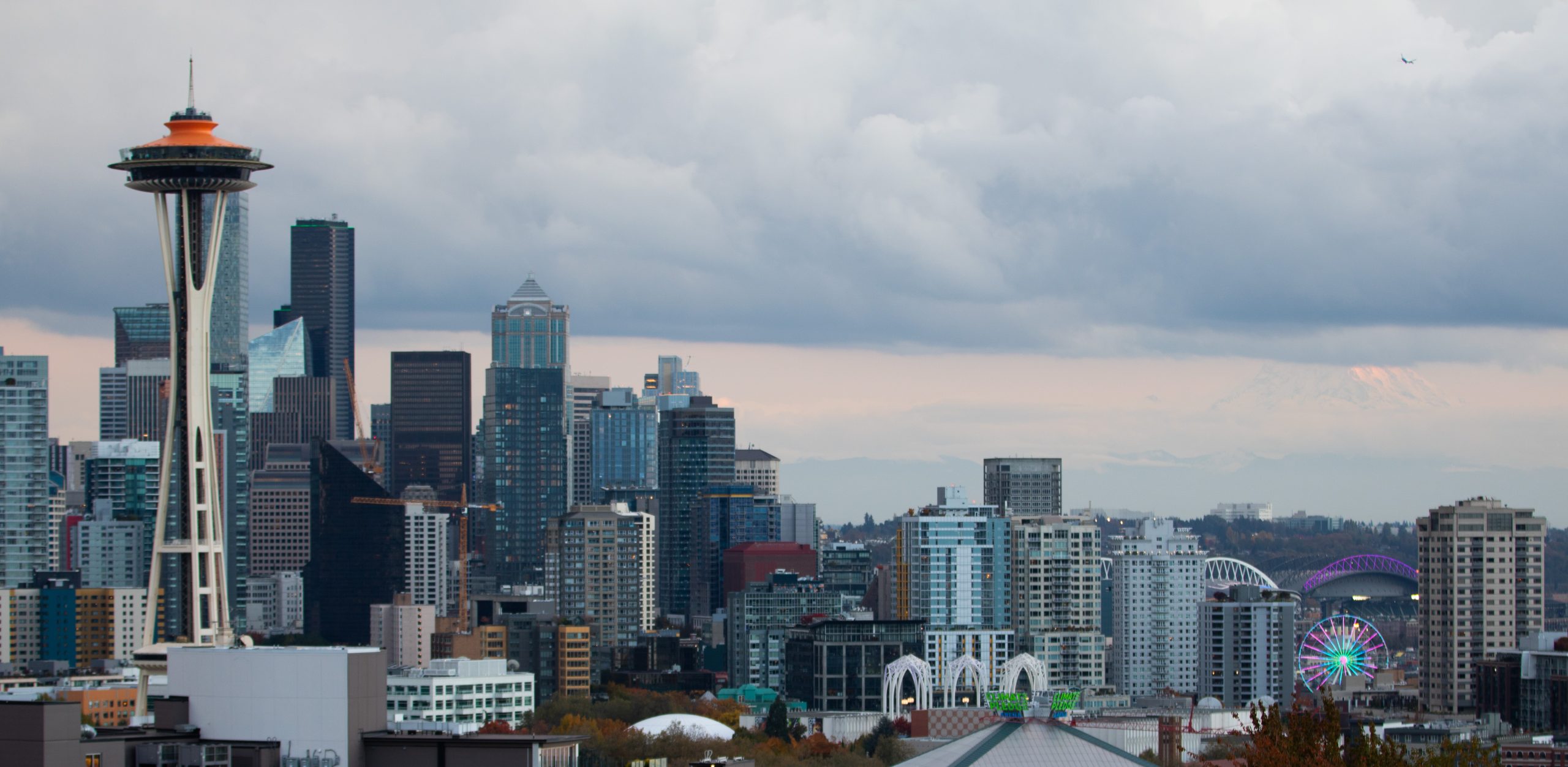 Seattle cityscape with Space Needle, Climate Pledge Arena and the wheel